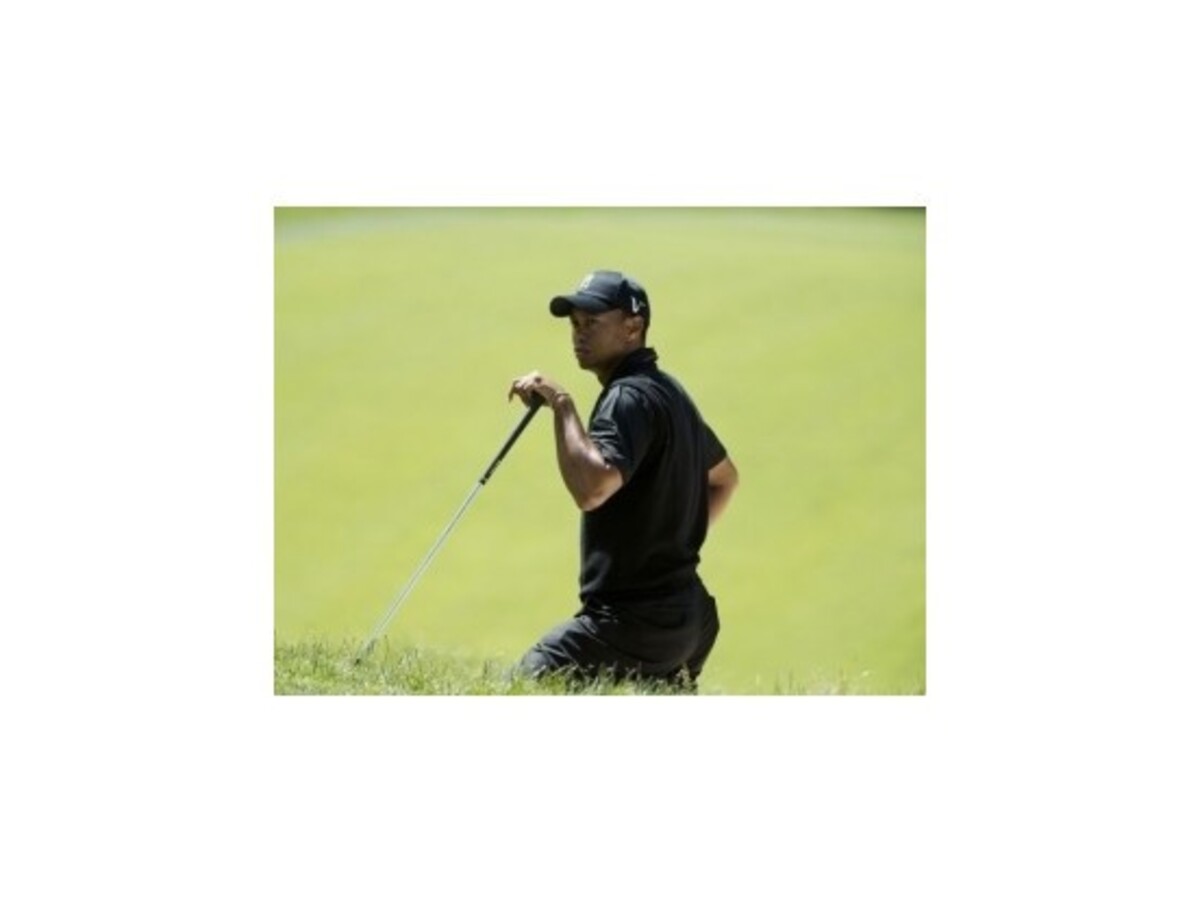 Woods sa delí o vedenie na US Open, McIlroy skončil