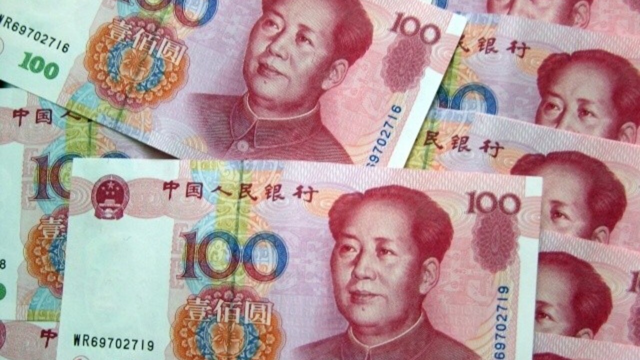 Čína jüan mena peniaze (ČTK/DPA)
