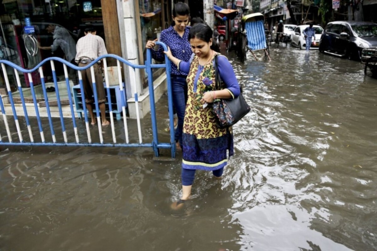 india-floods-e4fc8b5e6b264909bf89681611b3ee70_97cb6858.jpg