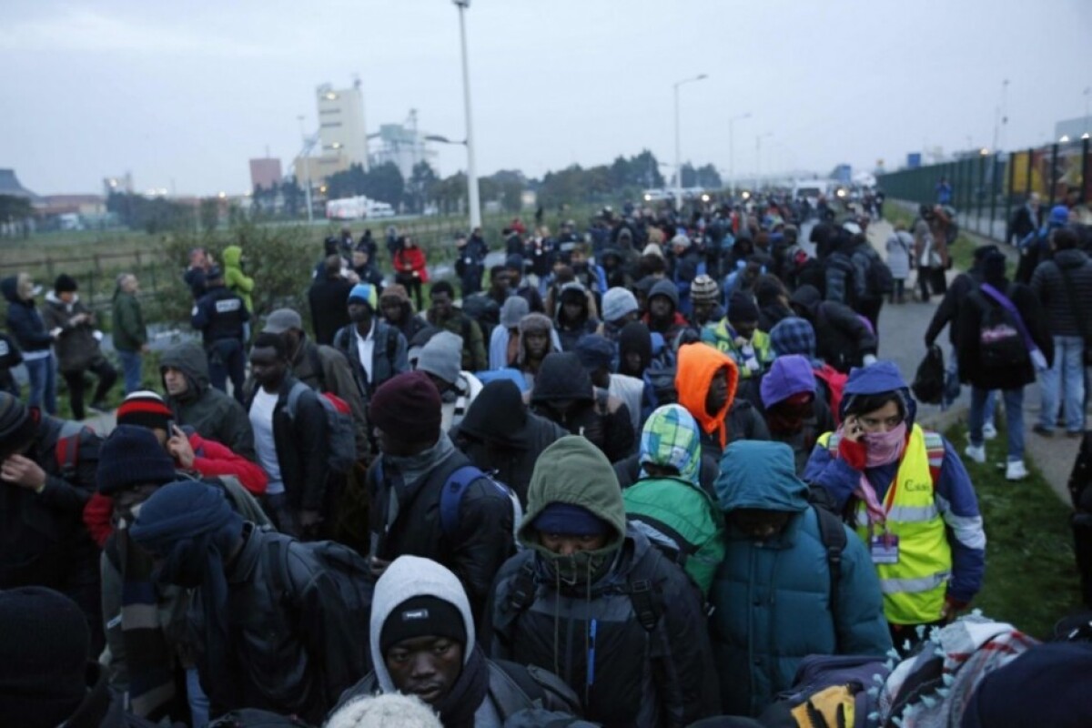 france-migrants-95d3bb7a15bf4202b871e712a1853b3d_e596592f.jpg
