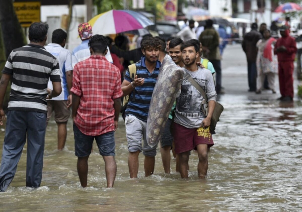 india-monsoon-flooding-27007-c0f0dbd586774072ac7f8fcd066b9b8a_0db8f033.jpg