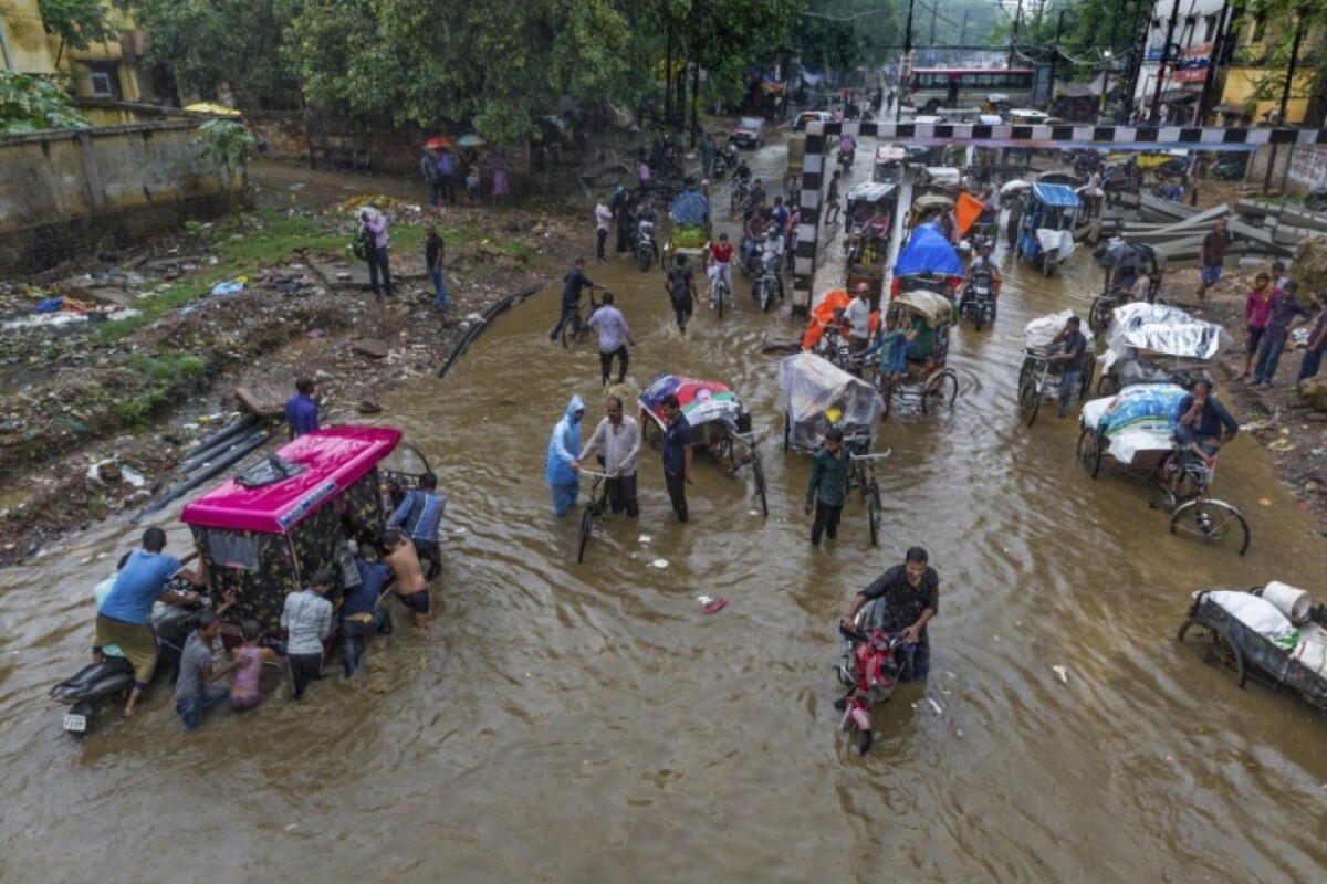 india-monsoon-flooding-91526-61ef69bc2c5e49519a652f8db8a0e1a6_5b0d2f14.jpg