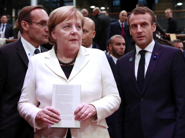 Pseudovoľby, tvrdia Merkelová a Macron o hlasovaní v Donbase