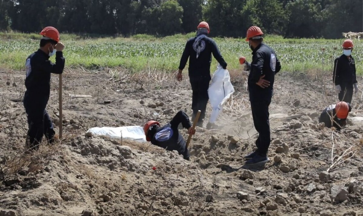 syria-mass-grave-33895-3ffa206655f84a08bf864447e893ee66_3eec15ae.jpg