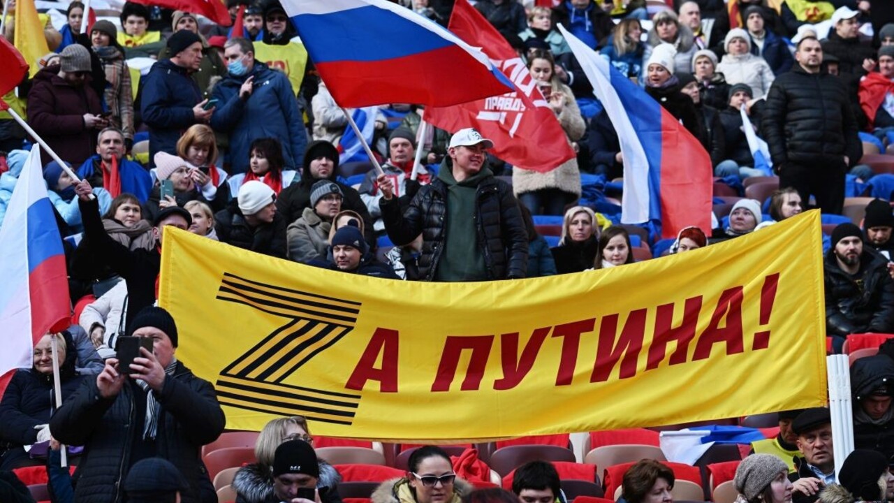 Priaznivci Putina na moskovskom štadióne