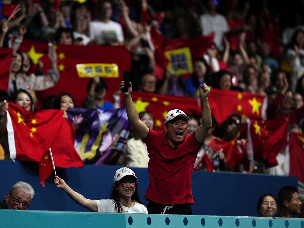 činski fanušikovia na olympiáde na