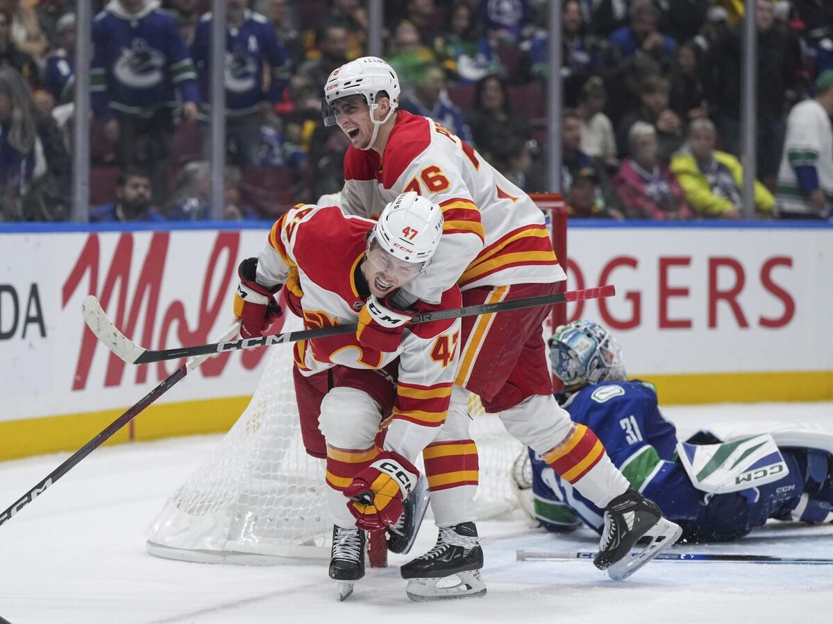 Flames_Canucks_Hockey Pospíšil