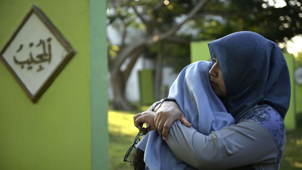 Indonesia_Asia_Tsunami_Anniversary indonezia cunami vyrocie zena hrob