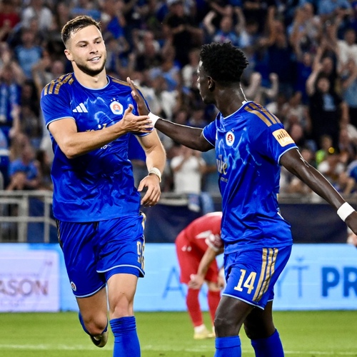 Mykola Kucharevič a Alasana Yjarang, obaja z ŠK Slovan Bratislava sa tešia po góle 1:0 počas odvetného zápasu 2. kola kvalifikácie Ligy majstrov UEFA 2026/27 medzi ŠK Slovan Bratislava - Iberia 1999 Tbilisi. Bratislava 29. júl 2026. 